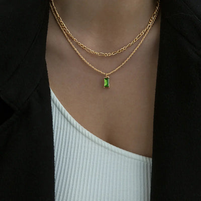 Emerald crystal with twisted chain
